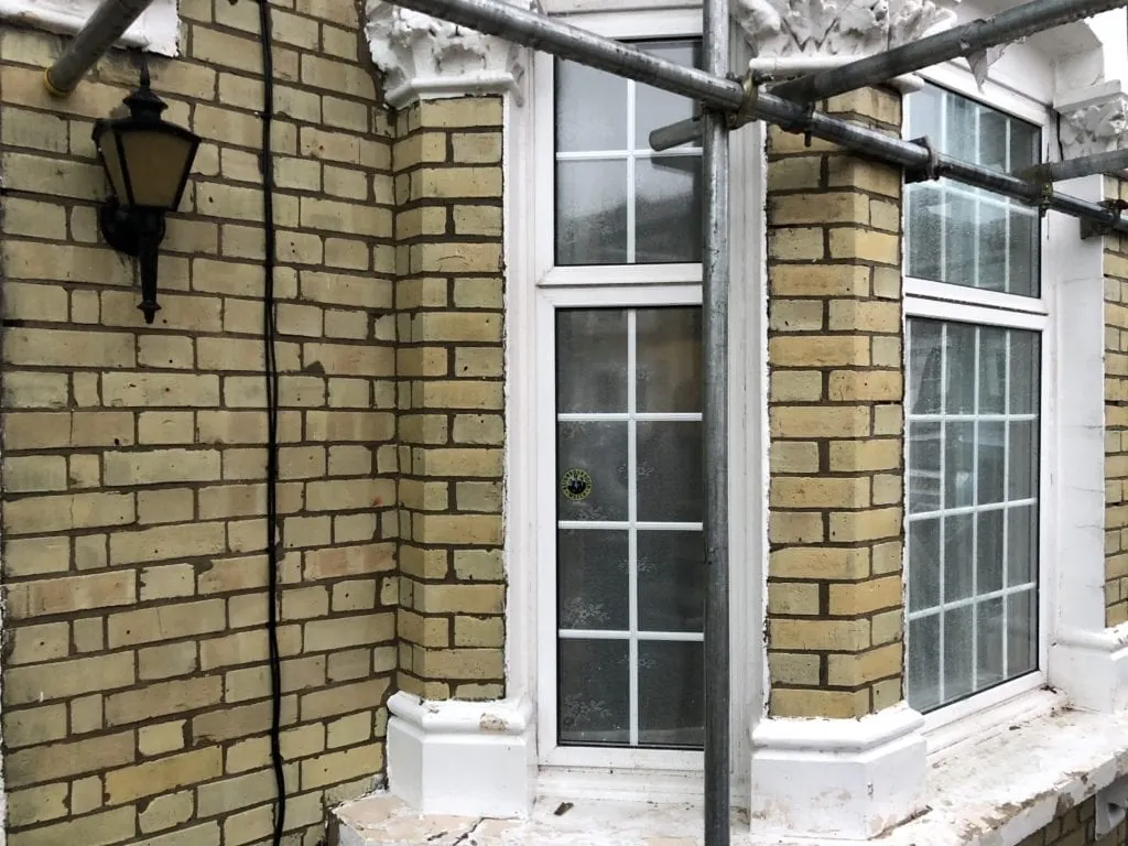 brick-cleaning-highgate-n6-victorian-window-detail-after.webp